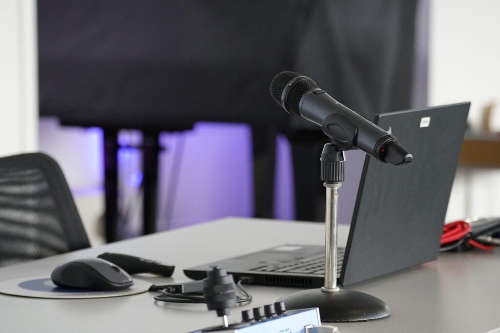 laptop, conference table, mouse